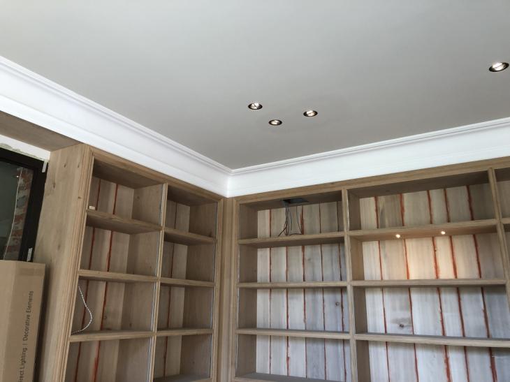 Schilderwerken plafond boekenkast